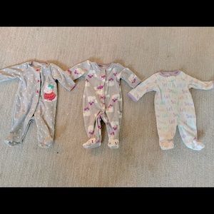 Five newborn baby girl outfits